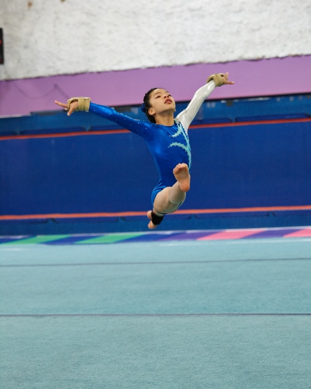 Catching air on the floor exercises.  ©2014 Ken Doo Photography